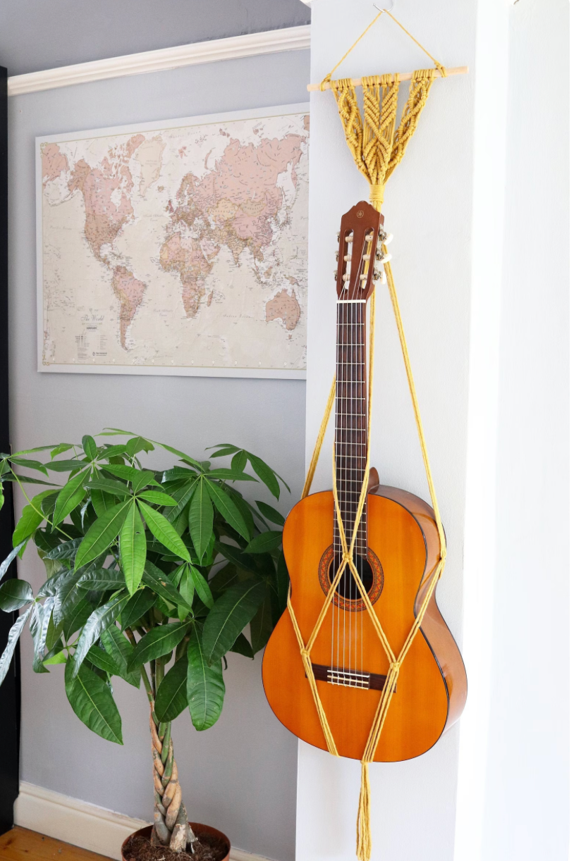 Classical guitar hanger deals